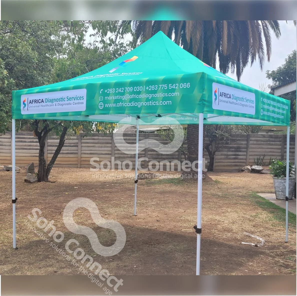 Branded event gazebo with company graphics applied to canopy and valance panels